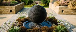 why you should & shouldn't buy a water feature - sculpture fountain. Garden by Bestall & Co.