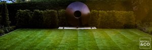 Small lawn used to present a sculpture piece by Gallery Forty Five. Garden by Bestall & Co.