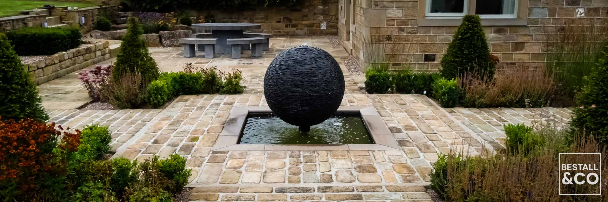 Water Feature Sculpture Focal Point, in a garden by Bestall & Co.